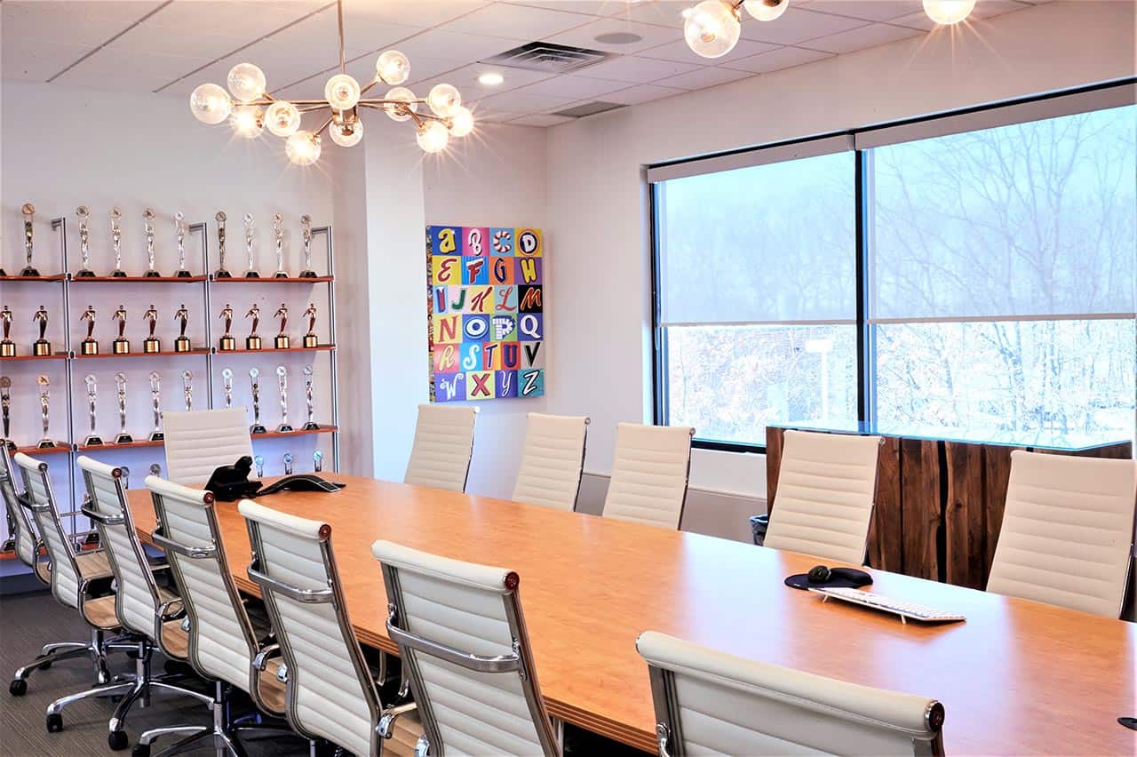 C Level Board room with dedicated space to show off awards and accolades of the company