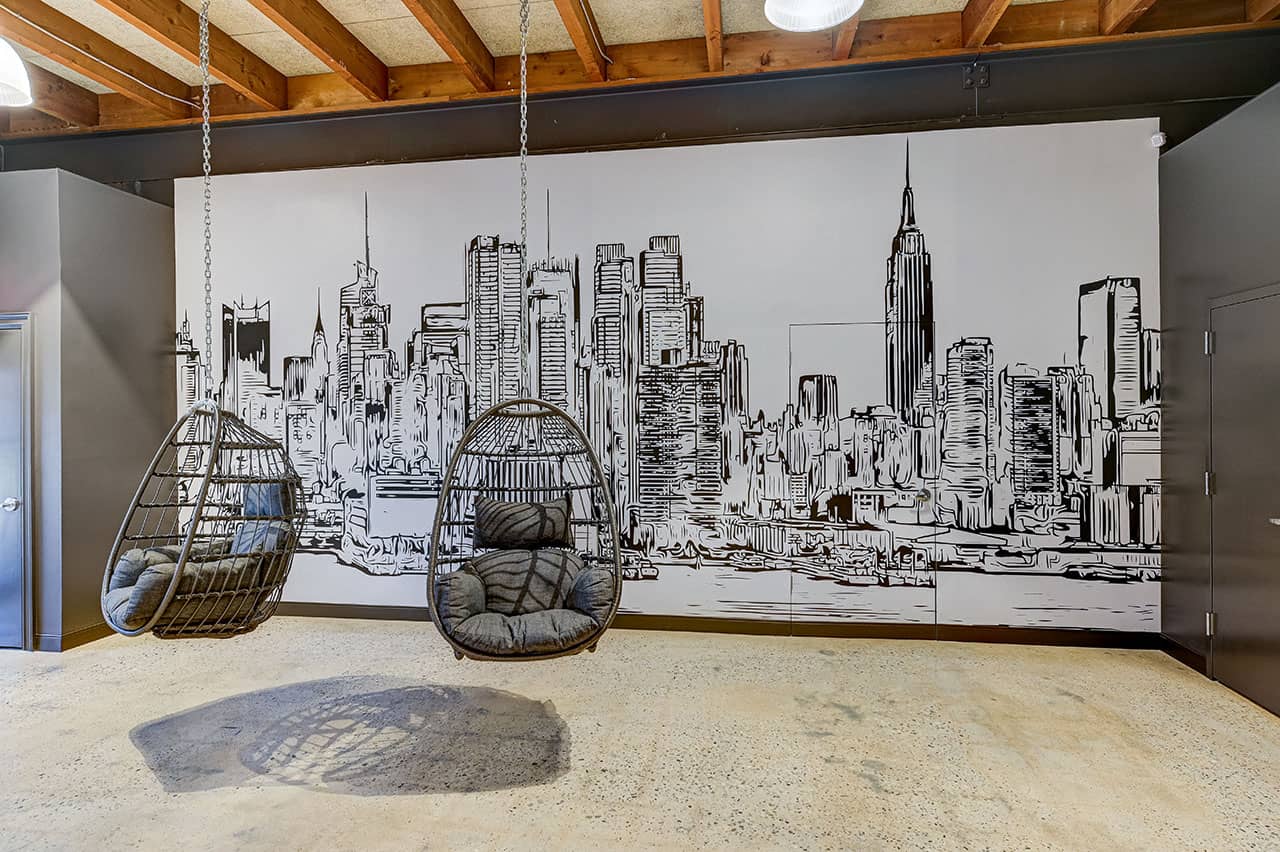 Corporate office mural with hanging seating
