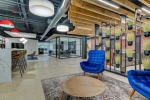 cool office interior with blue chairs and plants