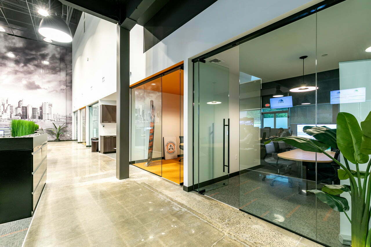 Open concept offices and collaboration room that give employees a dedicated space to concentrate and collaborate