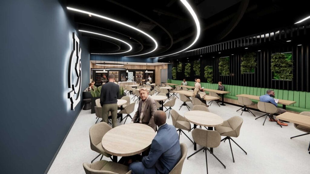 Cafeteria lounge at Pharmaceutical Campus with green seating, wood tables, and biophilic wall design.