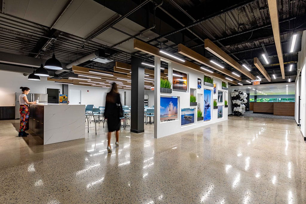 Waterview Blovard project image. Of a large reception area, equipped with modern interior elements and artwork