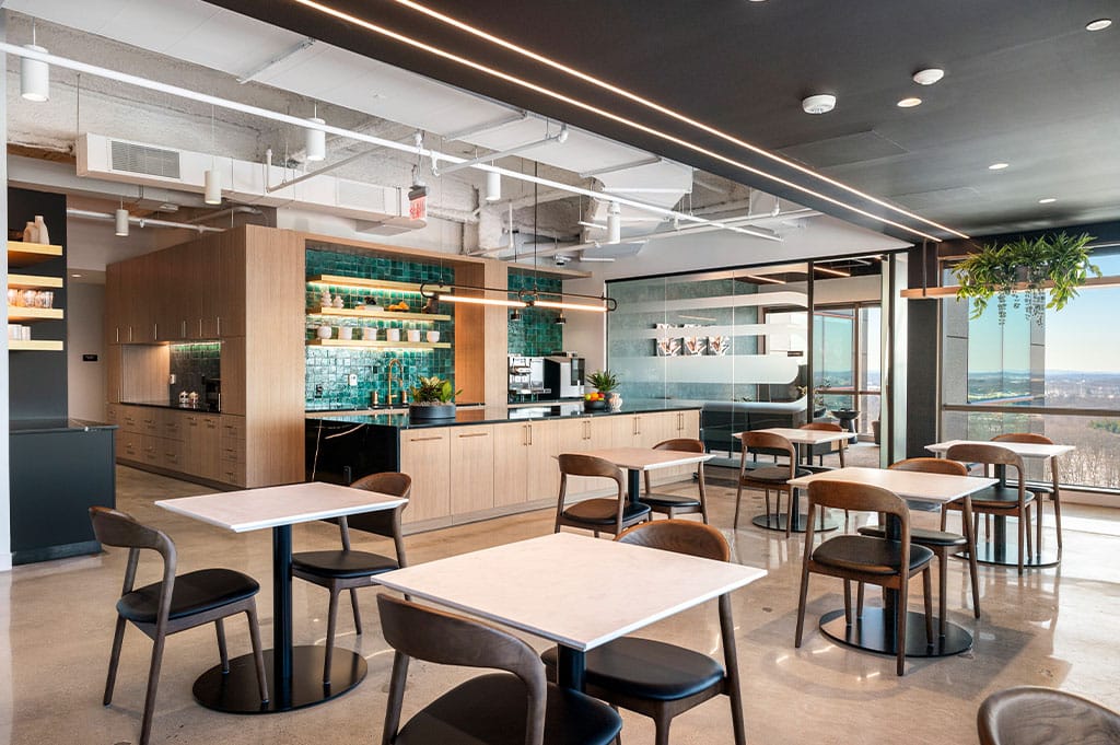 RI project image of the hub area in an office setting, a render visualisation of how the space will have a modern touch paired with open space planning and generous seating areas