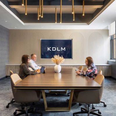 Classic boardroom with staff in meeting